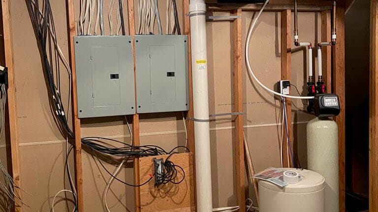 New construction basement with radon mitigation system installation
